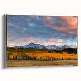 Framed canvas landscape art painting of Telluride, Colorado with colorful autumn trees and silver frame.