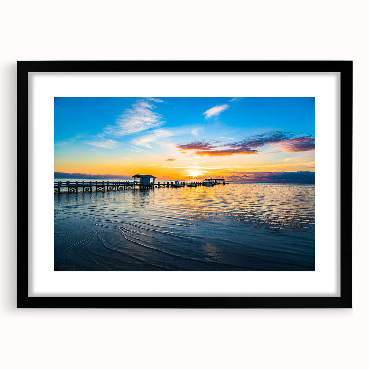 Colorful abstract art print of the Florida Keys in vibrant blue and green tones on a large textured canvas.