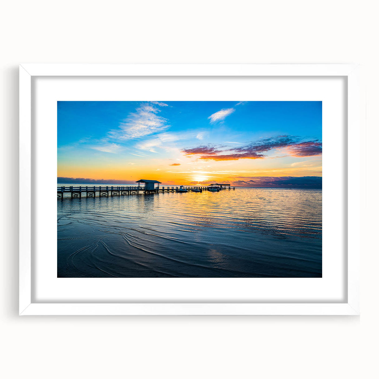 Abstract art print of Florida Keys in muted blue and green tones on a framed white canvas, ideal for dining room decor.