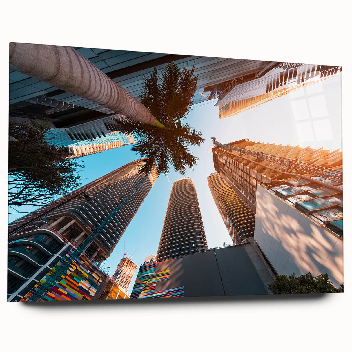 Acrylic print of a large abstract depiction of Miami in vibrant blue and pink tones, ideal for bedroom or dining room art.