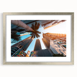 Textured art print of an abstract Miami skyline in cool blue and silver tones, framed in silver, ideal for bedroom art.