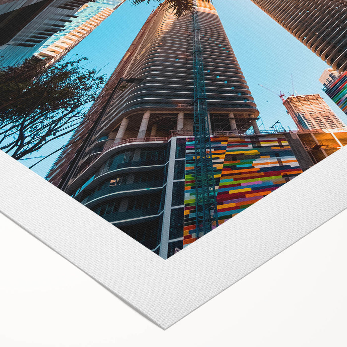 Art deco poster of Miami skyline in pastel shades on rolled canvas, suitable for dining room wall.
