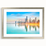 Textured art print of an abstract Chicago skyline in silver frame, using cool gray and blue tones, ideal for bedroom art.
