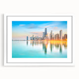 Abstract art print of Chicago skyline in muted blue and gray tones on a framed white canvas, ideal for dining room decor.