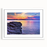 Abstract art print of Lake Michigan in soft blue and white tones, framed with a white mat.