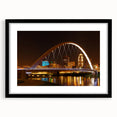 Abstract art print featuring textured, colorful art of Iowa scenery in a black frame, ideal for living room decor.