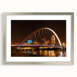 Textured art depicting abstract Iowa scenery in muted earth tones, framed in silver, suitable for bedroom decor.