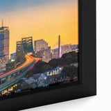 Framed canvas featuring a textured depiction of the Boston skyline in black with colorful accents.
