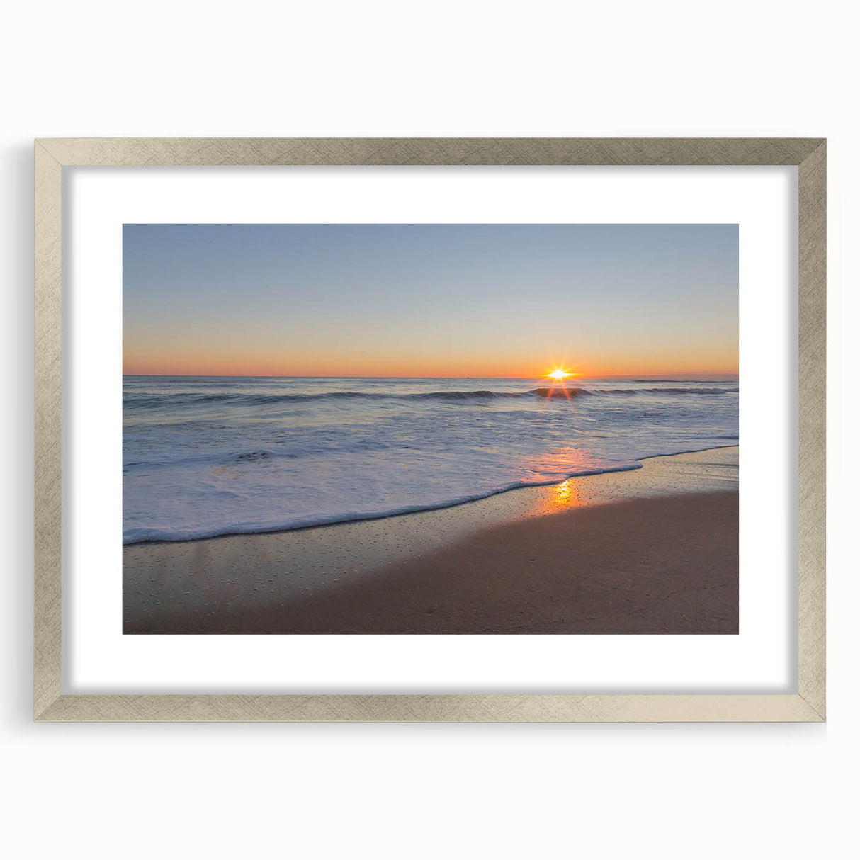 Textured abstract art print depicting the Massachusetts Cape in muted blue and gray tones, framed in silver.