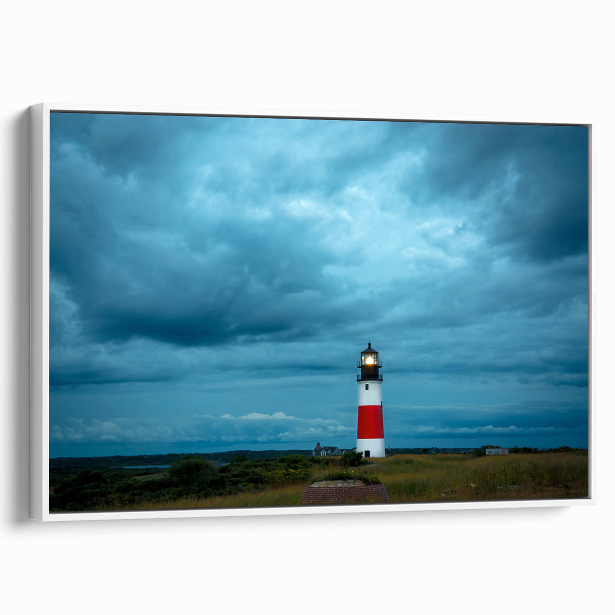 Vintage poster art of Nantucket scenery in colorful hues on a framed canvas, ideal for large living room walls.