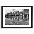 Extra large abstract art print of a colorful, textured Minneapolis skyline, in a black frame with mat.
