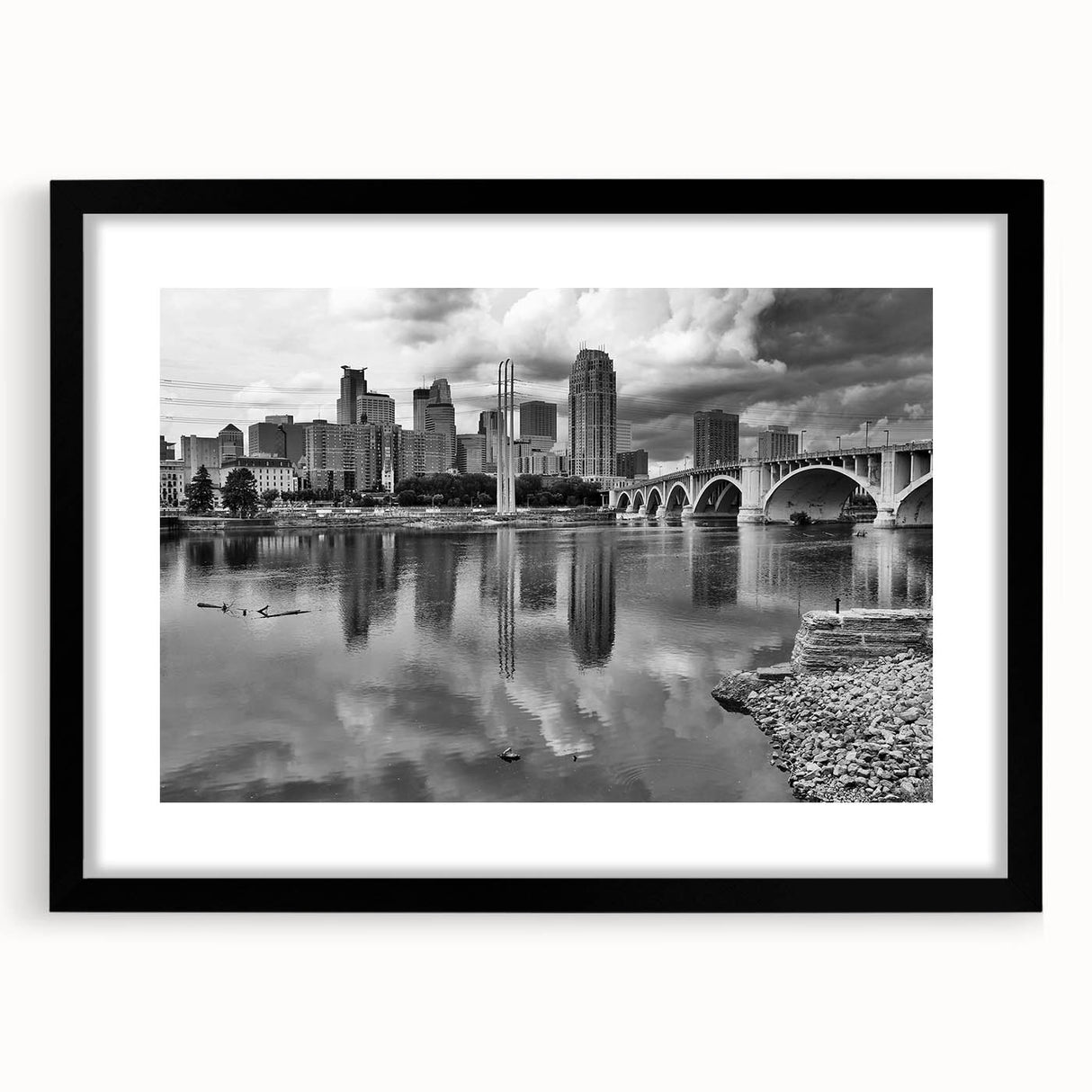 Extra large abstract art print of a colorful, textured Minneapolis skyline, in a black frame with mat.