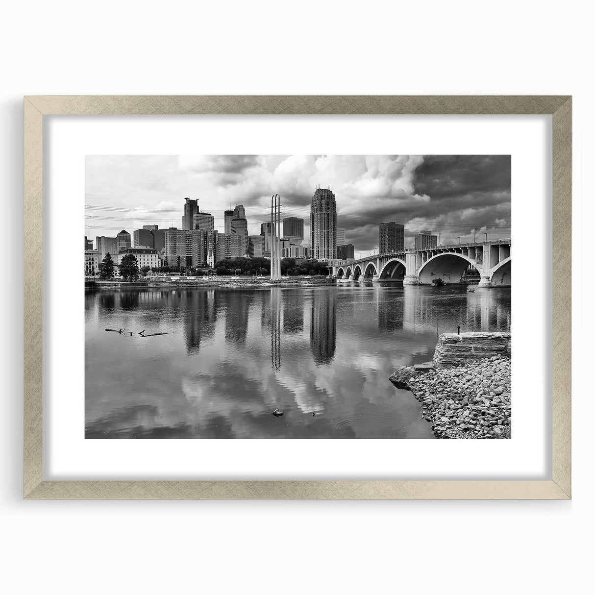 Textured abstract art print of Minneapolis skyline in muted gray and silver tones on a framed canvas.