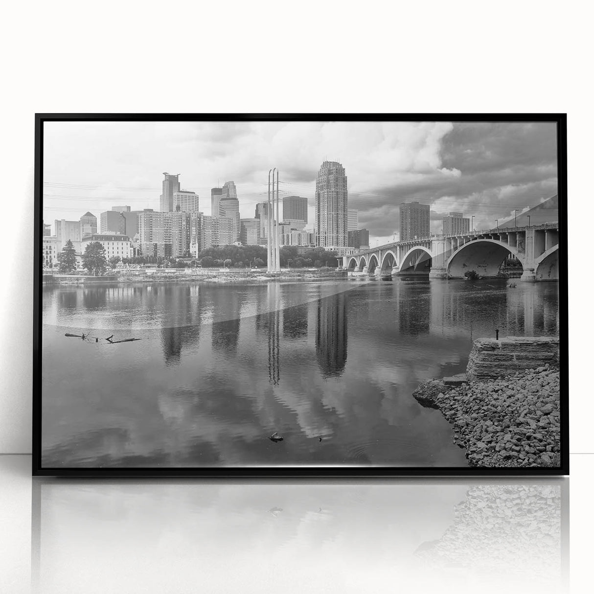Large abstract wall art of Minneapolis skyline in muted gray and blue tones on framed acrylic, ideal for modern office decor.