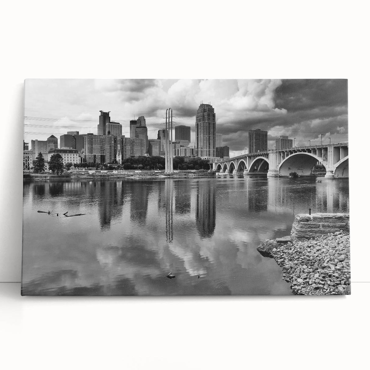 Black and white stretched canvas of Minneapolis skyline, ideal for kitchen wall art or bedroom ambiance.