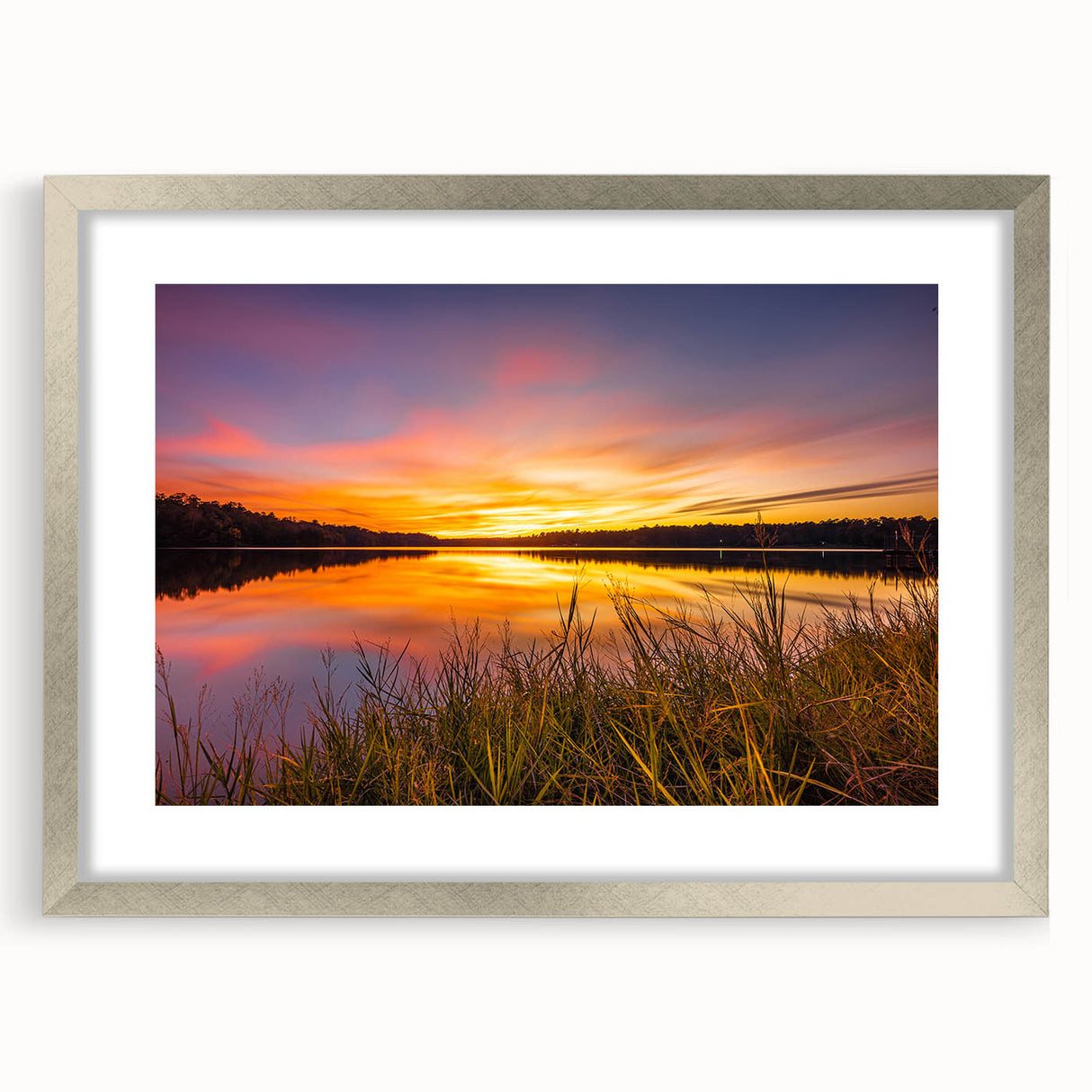 Textured art print of an abstract Mississippi landscape in muted earth tones on a framed silver mat.