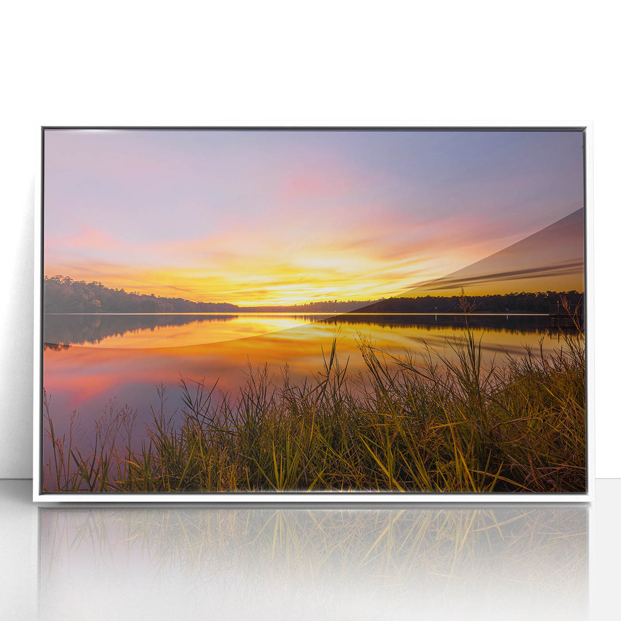Acrylic print of a serene Mississippi landscape in muted green and blue tones, framed in white.