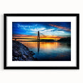 Abstract art print of Kansas City skyline in vibrant colors on a large framed canvas, suitable for living room decor.