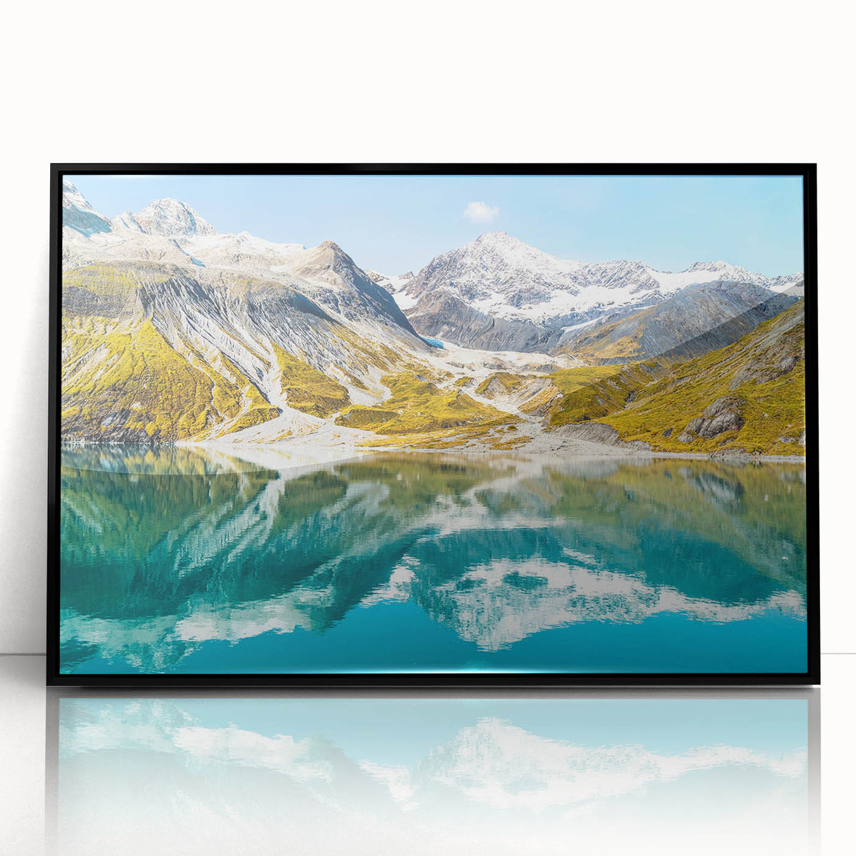 Large abstract wall art depicting a serene Montana glacier landscape in muted blue and white tones, framed in black acrylic.
