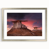 Textured abstract art print featuring earthy tones, framed in silver, ideal for bedroom art.