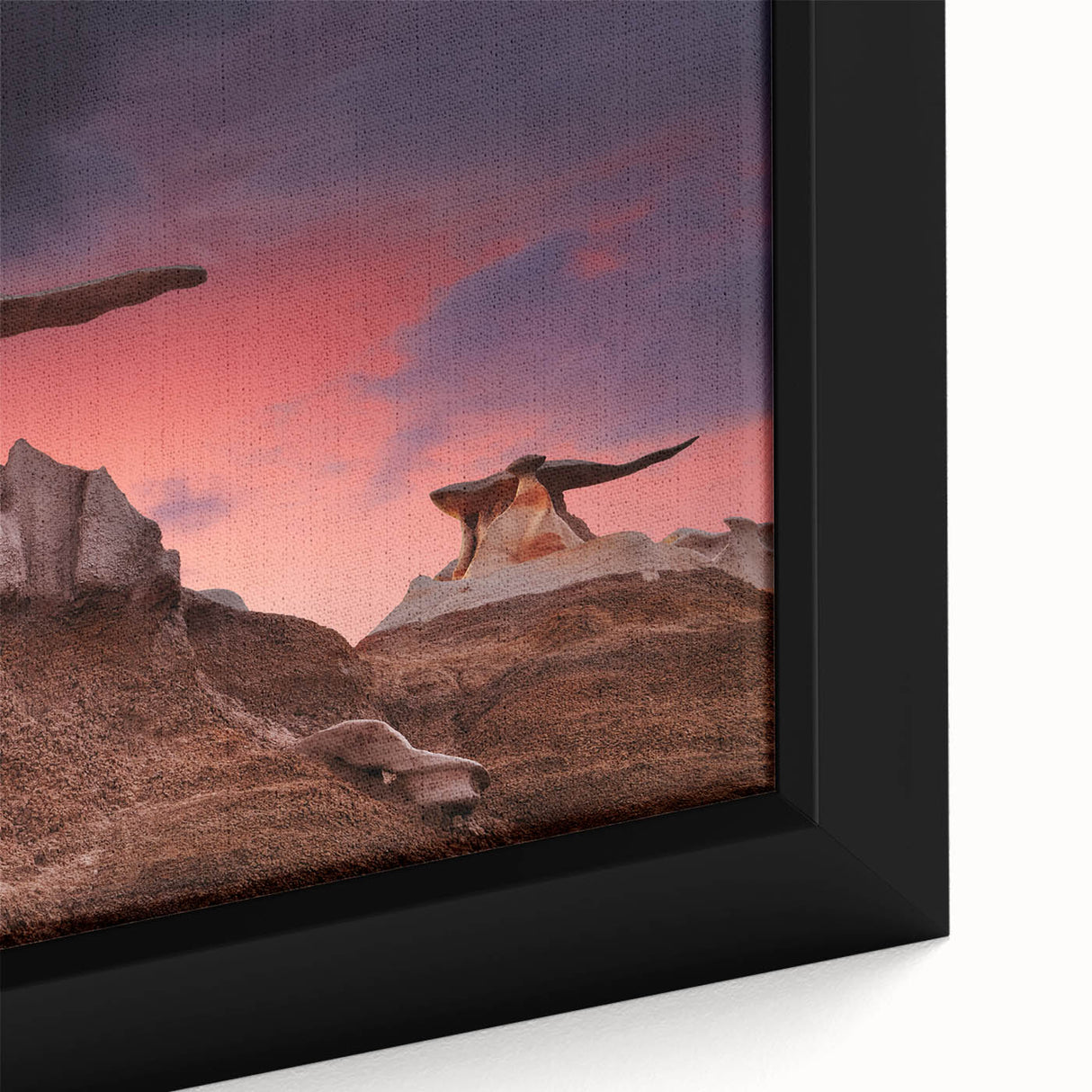 Framed canvas of a textured New Mexico landscape in black with colorful accents, suitable for large living room walls.