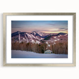 Textured abstract art print of Adirondacks scenery in muted earth tones, framed in silver, suitable for bedroom decor.