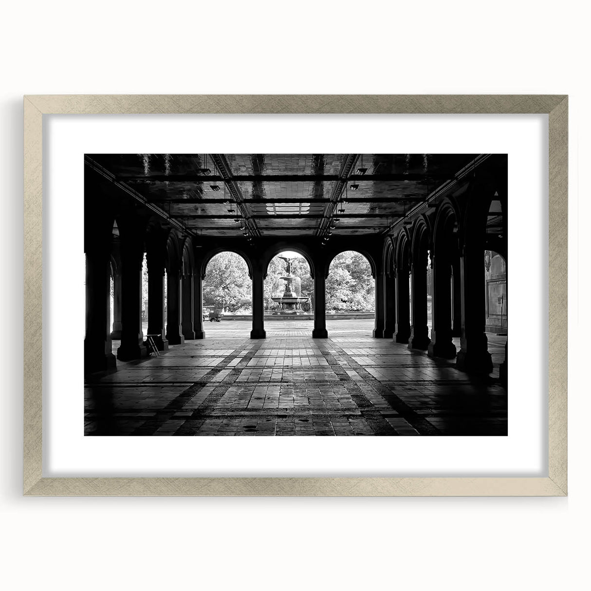 Textured art print of Central Park in abstract style, rendered in muted green and brown tones, framed in silver.