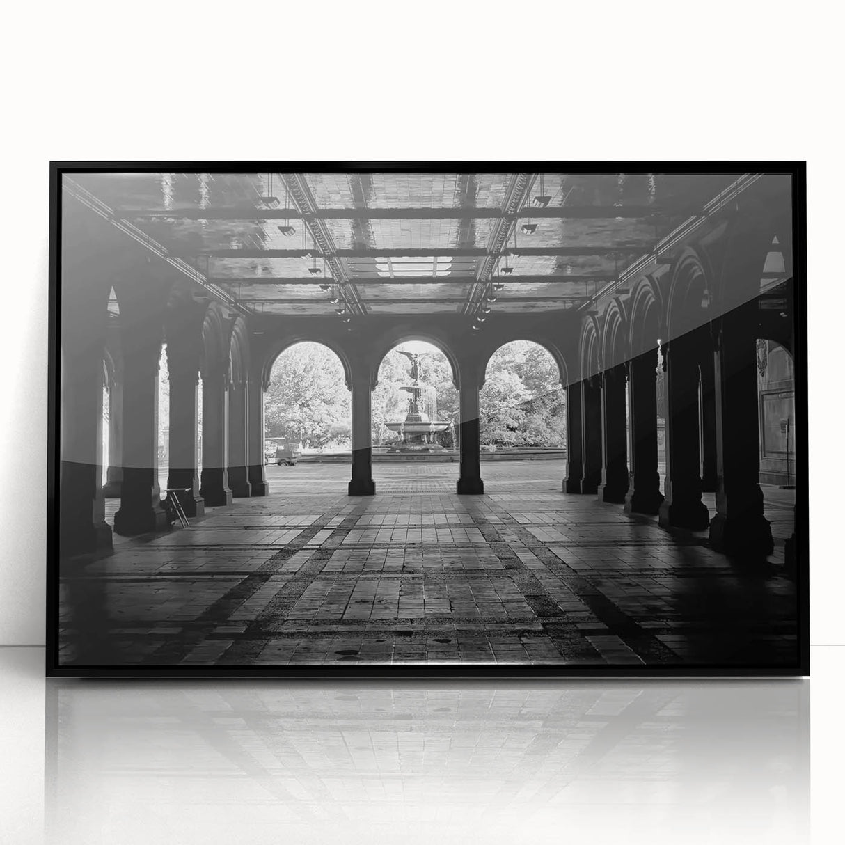 Large abstract wall art of Central Park with muted green and brown tones, framed in black acrylic.