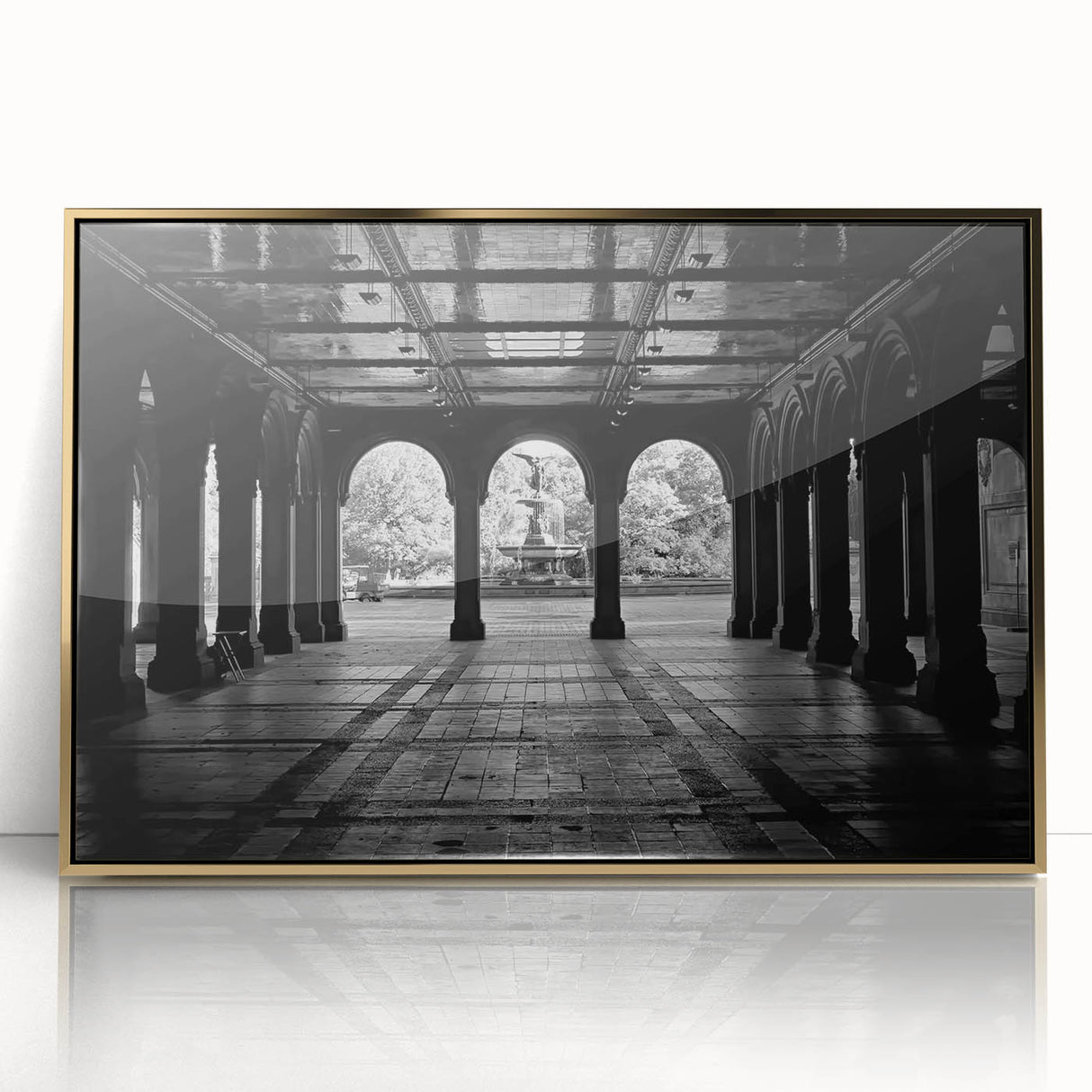 Large art print of Central Park with muted green and gold tones in a mid-century modernist style, framed in acrylic.