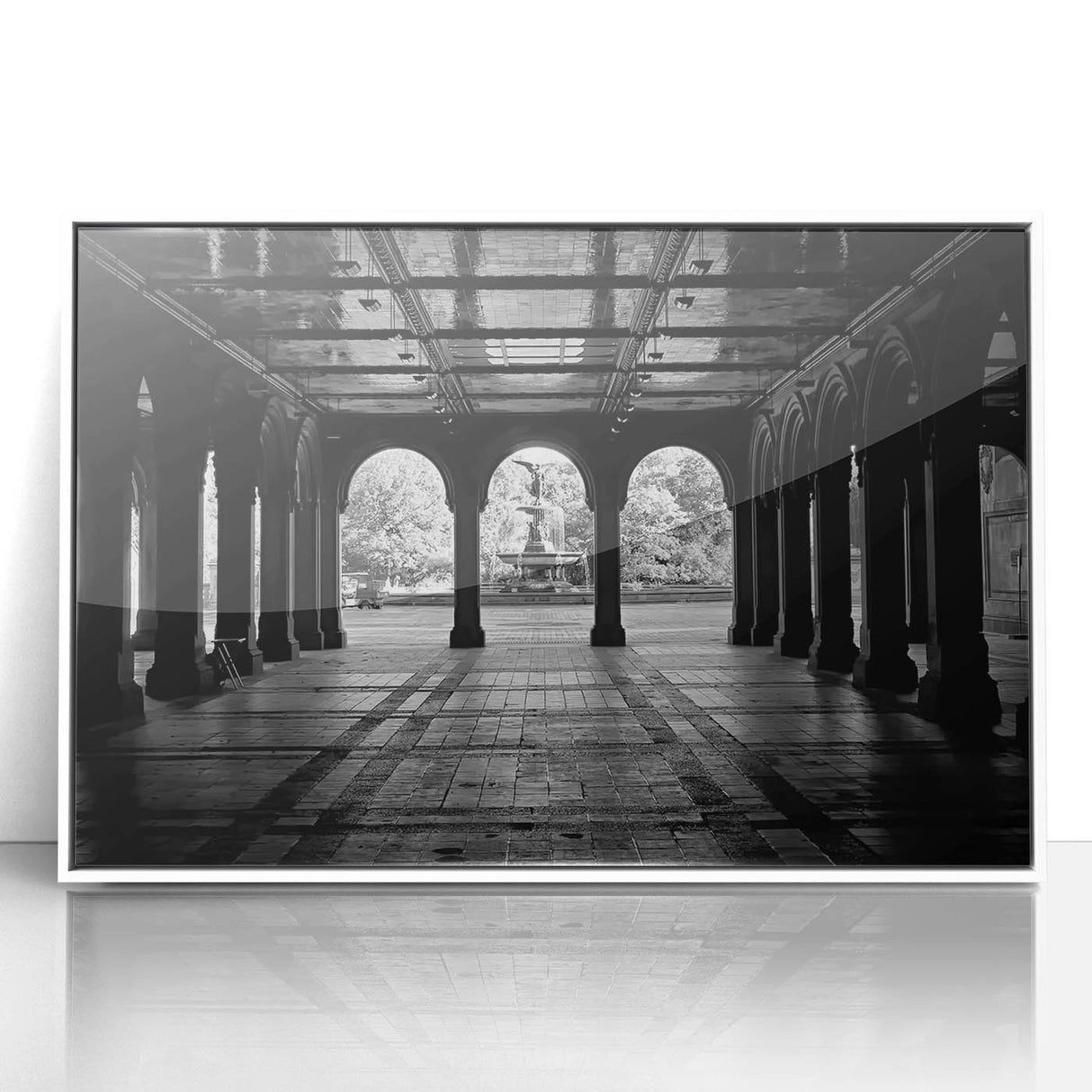 Acrylic print of Central Park in muted green and brown tones, framed in white, suitable for modern art wall decor or nursery.