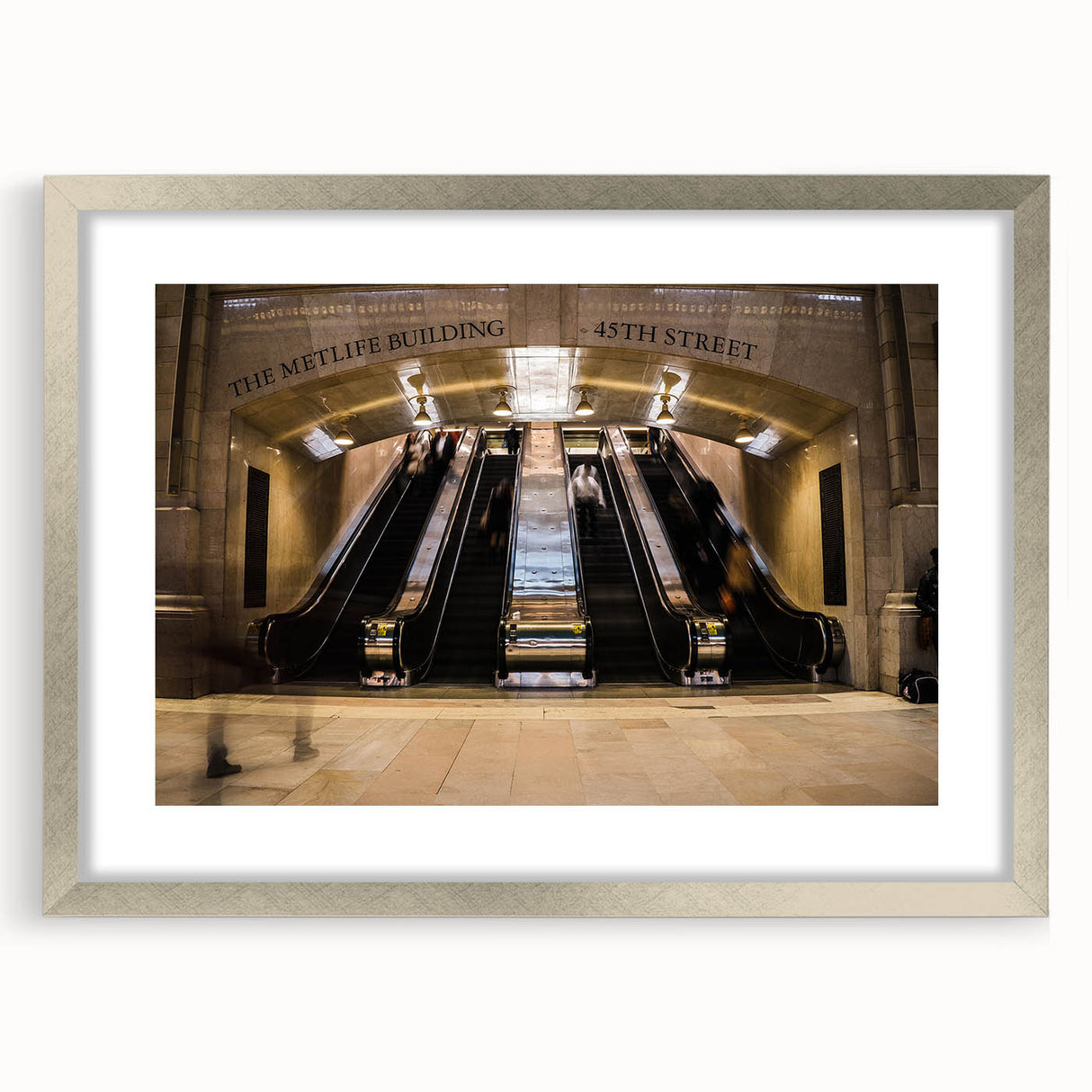 Textured abstract art print depicting New York City's Grand Central, in muted gray and silver, framed with mat.
