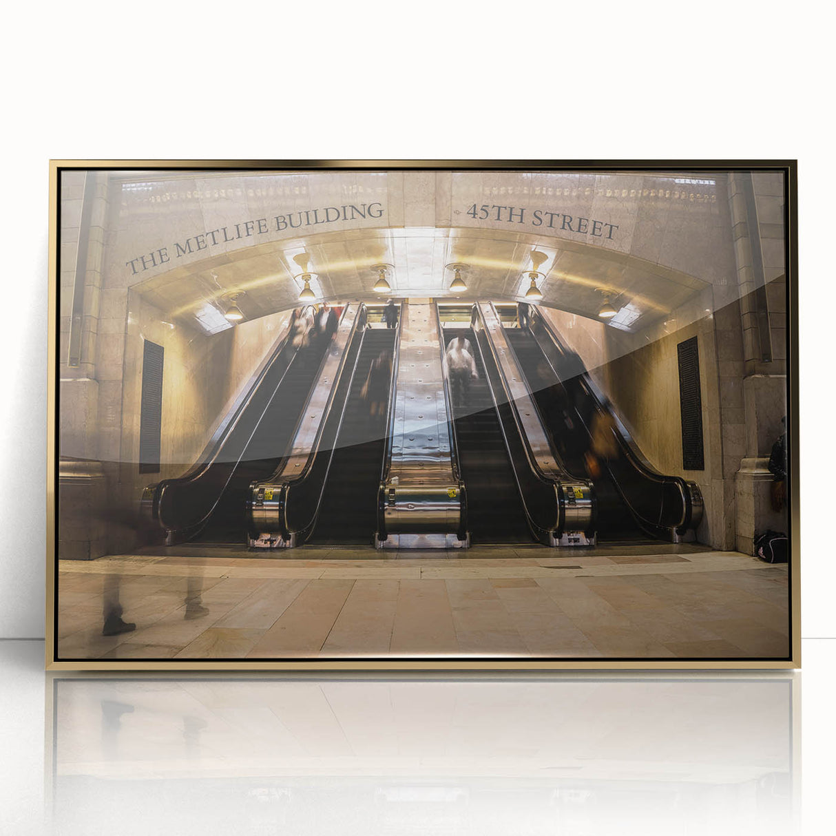 Large art print of New York City's Grand Central Station in gold tones on acrylic, styled in mid-century modernist design.