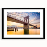 Extra large framed wall art of Manhattan Bridge in vibrant, colorful abstract style, ideal for living room decor.