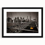 Extra large abstract art print of colorful Manhattan skyline on textured canvas, framed in black.
