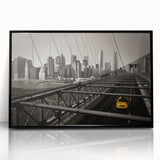 Large abstract wall art depicting Manhattan's skyline in muted black and gray tones on a framed acrylic.