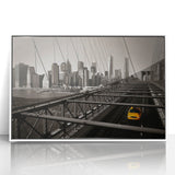 Art deco poster of Manhattan skyline in muted gray and blue tones, framed acrylic print.