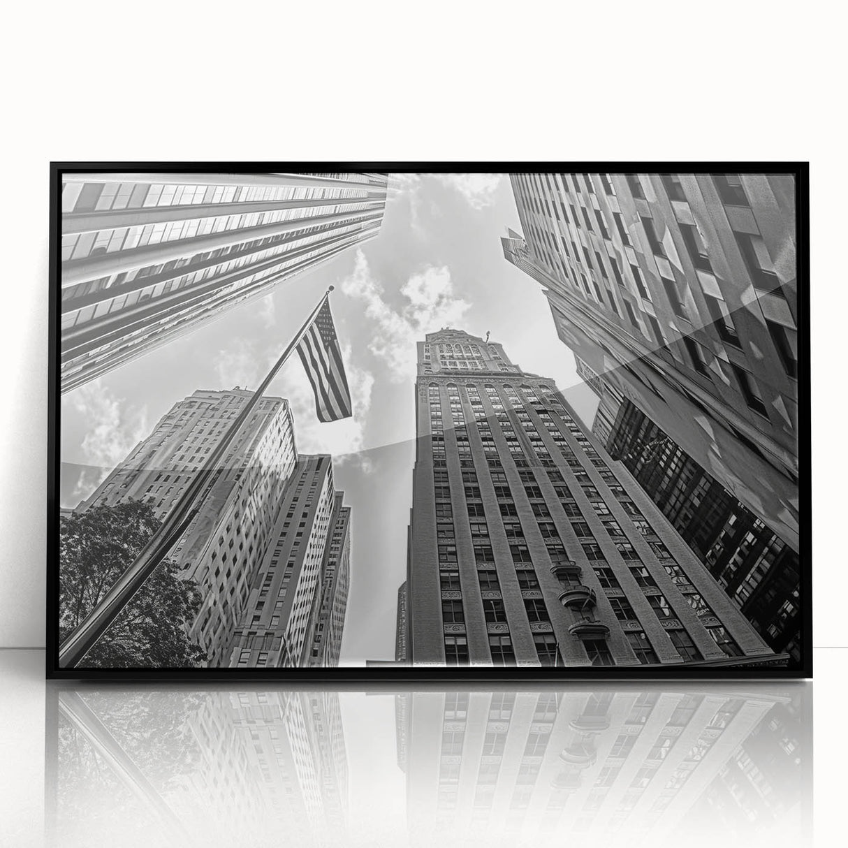 Large abstract wall art depicting New York City's Rockefeller Center in muted gray tones on a framed acrylic.