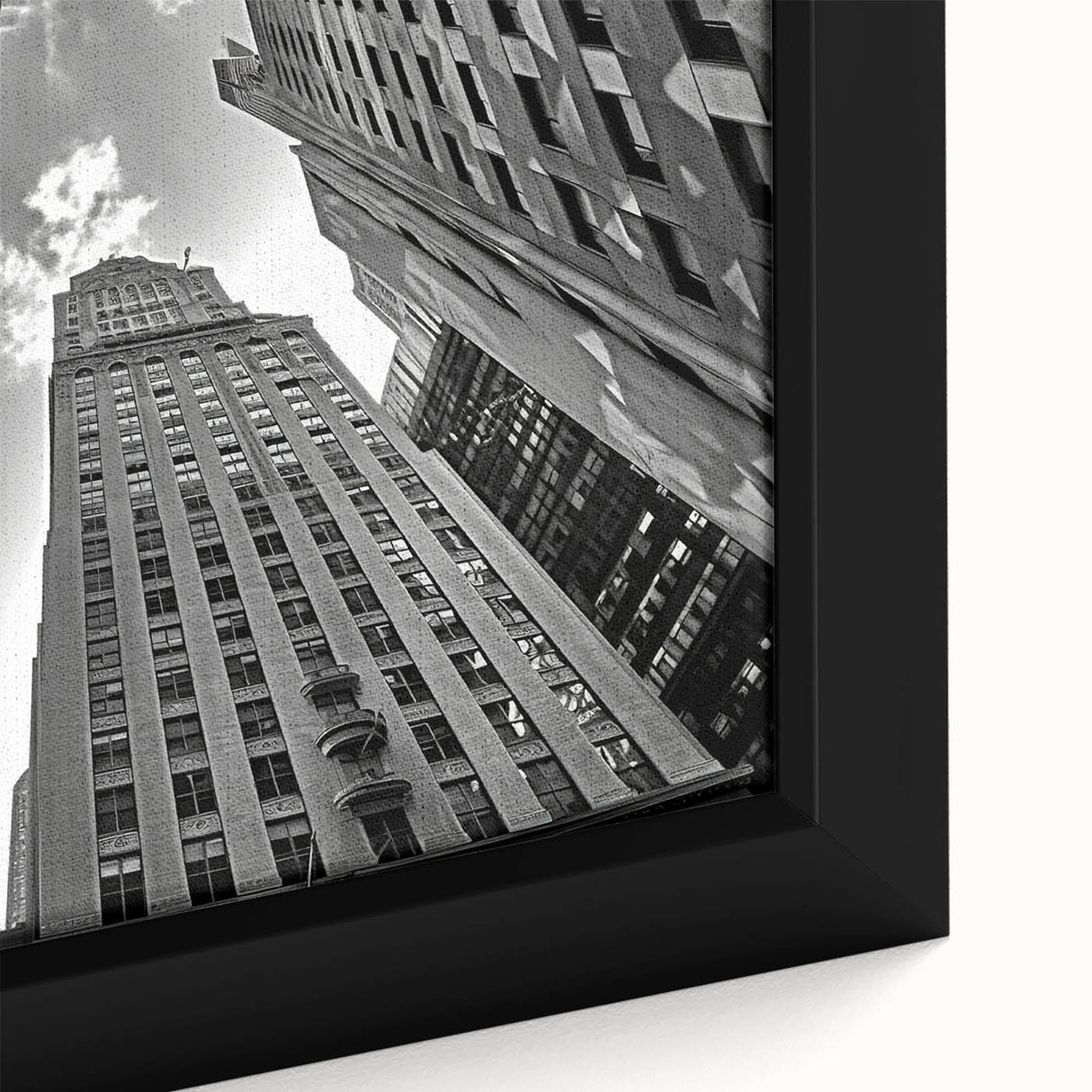 Extra large framed canvas featuring a textured depiction of the NYC Rockefeller skyline in black with colorful accents.
