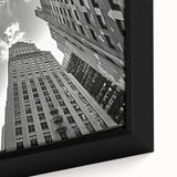 Extra large framed canvas featuring a textured depiction of the NYC Rockefeller skyline in black with colorful accents.