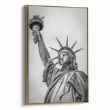 Framed canvas of the Statue of Liberty in black and gold tones, ideal for bedroom wall art.