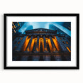 Colorful abstract art print of NYC skyline with textured brush strokes on a large black-framed canvas.