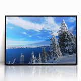 Large abstract wall art of Crater Lake in muted blue and green tones on a black framed acrylic.