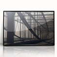 Large abstract wall art depicting the Pittsburgh skyline in muted gray and blue tones on a framed acrylic.