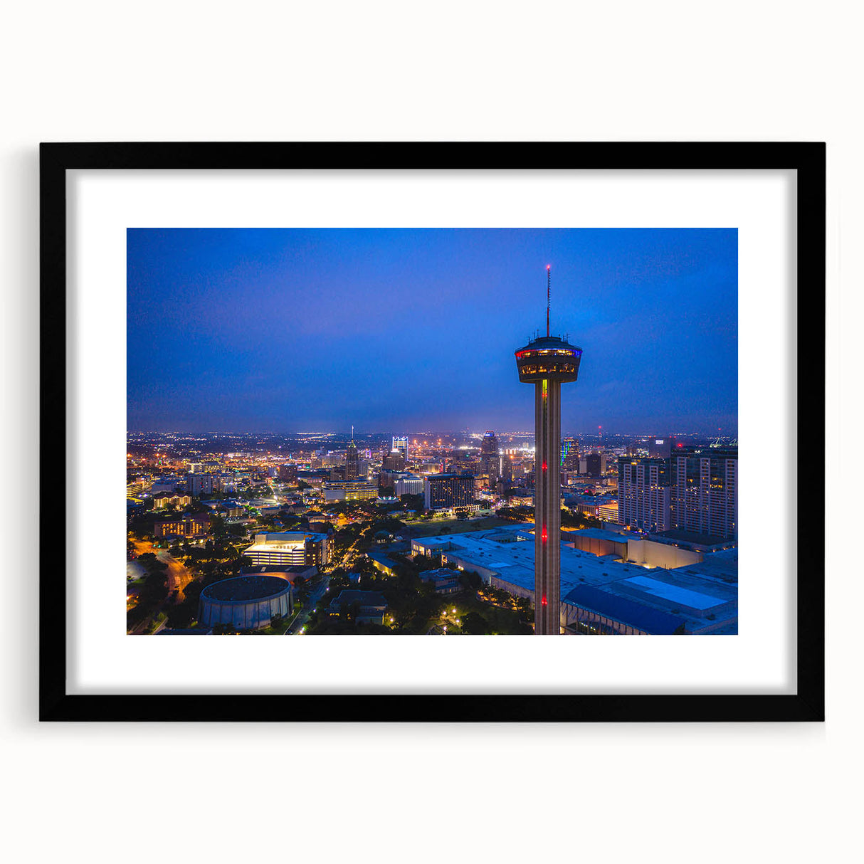 Abstract art print of San Antonio skyline in vibrant, colorful hues on a large textured canvas, ideal for living room decor.