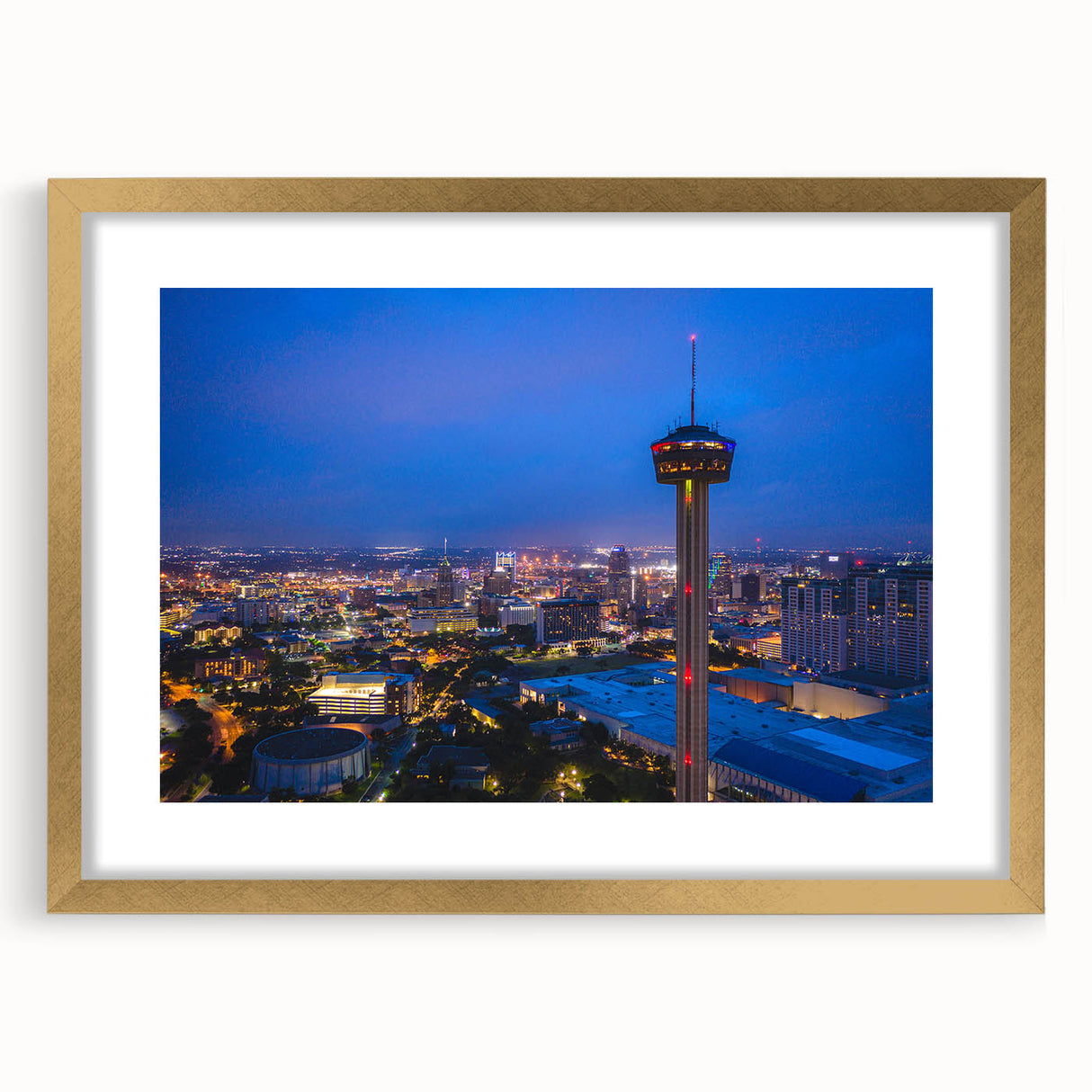 Extra large wall art depicting an abstract textured scenery of San Antonio, in muted earth tones, framed in gold.