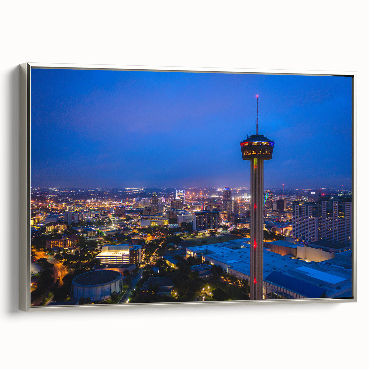 Framed canvas landscape art painting of San Antonio skyline with colorful and black vintage poster art style.