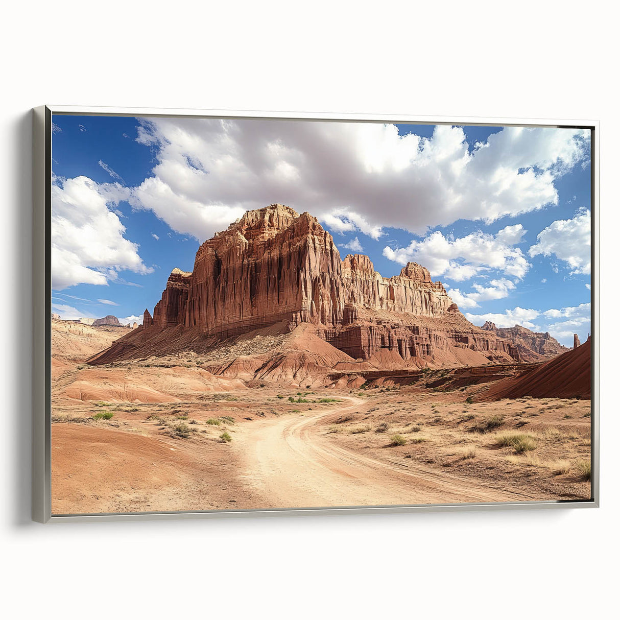 Landscape art painting of Capitol Reef, Utah, depicted in vibrant colors on a silver-framed canvas.