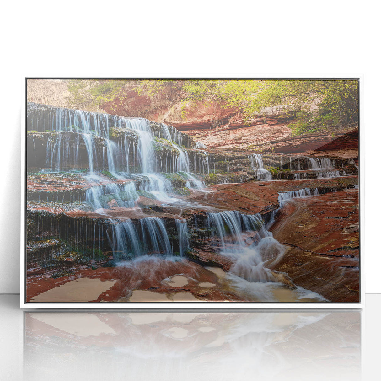 Acrylic print of Zion National Park in muted earth tones, framed in white, suitable for modern art wall decor.