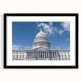 Colorful abstract art print of the Washington DC Capitol, in a black frame with mat, ideal for living room decor.