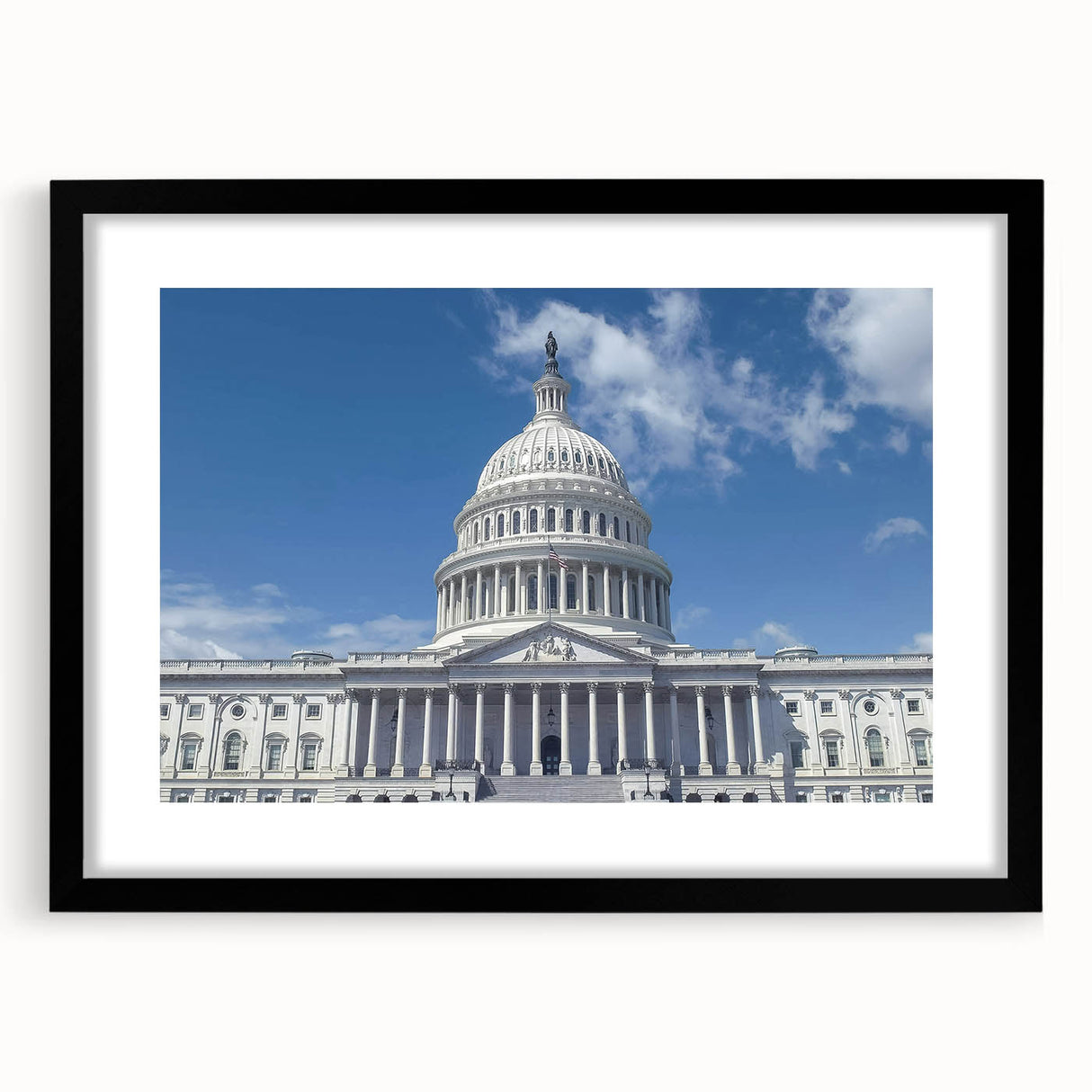 Colorful abstract art print of the Washington DC Capitol, in a black frame with mat, ideal for living room decor.